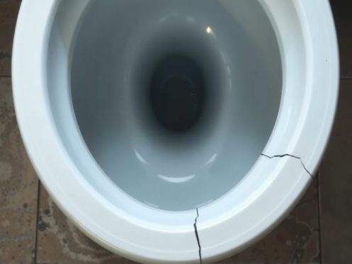 Cracked toilet bowl.